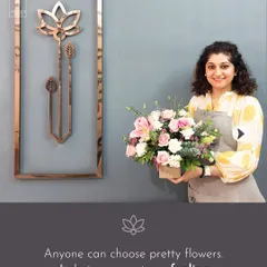 Anyone can choose pretty flowers, but a designer creates a feeling. This student holds her beautiful arrangement, having learned how to combine color and texture to evoke a specific emotion.