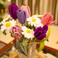 I created this bouquet of crochet tulips and daisies to offer blooms that last forever. Each flower is stitched with care, bringing a mix of vibrant purples, pinks, and fresh whites that can brighten any room, any day of the year, without ever wilting.