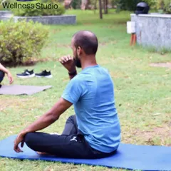 Yoga is a practice of both movement and stillness. This photo captures a moment of mindful focus during an outdoor yoga class, where we work on spinal twists to improve flexibility and aid digestion.