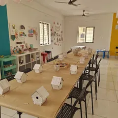 The studio is prepped for a birdhouse painting party. I make sure everything is organized and ready to go before the guests arrive.
