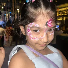 A full butterfly and flower design that covers one side of the face. This is a popular request at butterfly-themed birthday parties, and it always looks so adorable.