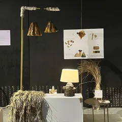 A display from 'Intersection', an exhibit we guest-curated at Raw Collaborative. The scene features lighting and objects made from natural and upcycled materials, showcasing a shared spirit of design innovation.
