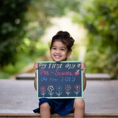 The first day of preschool is a huge milestone, full of excitement and big smiles. We took this photo outdoors to capture the feeling of a new adventure beginning. The little chalkboard sign adds a personal touch, turning a simple portrait into a cherished memory of a very special day.
