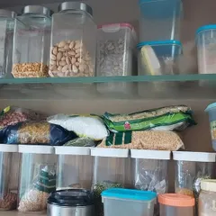 This 'before' picture is a familiar sight in many kitchens, with open packets and mismatched containers creating clutter. It highlights the exact problem my virtual service solves: turning this kind of disorganization into a streamlined, functional system.