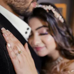 An intimate close-up capturing the deep affection between the couple. Amidst the celebration, we find these quiet moments that speak volumes about your bond.
