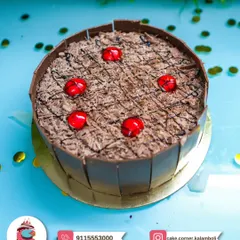A classic cherry chocolate cake, also known as Black Forest cake. The combination of chocolate shavings, whipped cream, and cherries is timeless.