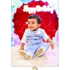 A little prince celebrates his first birthday with a big smile, surrounded by festive balloons. This photo highlights my approach to capturing the pure joy of children's parties.