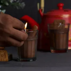 Lighting up my 'Chai Biscuit' candle, which smells just like cardamom tea.