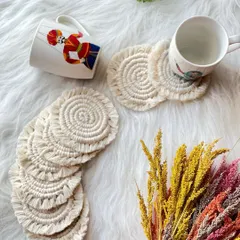 These round, fringed coasters are a classic boho accessory for any home. I can make them in over 20 colors to match your decor perfectly.