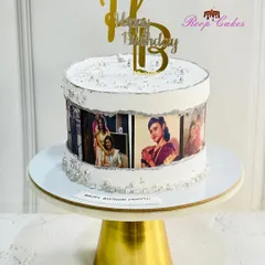 Another beautiful photo reel cake, this time with a silver and white theme. It's a wonderful way to showcase precious memories for a loved one's birthday.