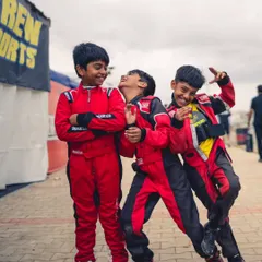 The future of our team. Our youngest micro-max drivers sharing a laugh in the pits. We foster a fun and supportive atmosphere where friendships are built alongside racing skills.