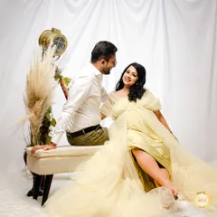 A beautiful moment in our light yellow tulle gown. We pair it with simple, elegant props like pampas grass to create a bright and airy scene.