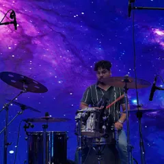 Our drummer dialing in his sound during the mic check for the Godrej event. A perfect soundcheck is crucial for a killer show.