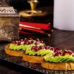 Fresh, flavorful, and fabulously plated. This avocado toast, topped with pomegranate seeds and sesame, is a perfect example of the culinary perfection I strive for in every dish.