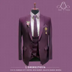 Color can be formal too. This three-piece suit in a deep wine color is tailored for a sharp, modern silhouette. It shows how we can move beyond traditional colors to create something that is totally you for a wedding or special event.