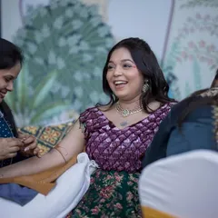 A candid shot from a henna ceremony that I'll never forget. The bride's happy smile is what makes this job so rewarding. It's a privilege to be part of such joyful moments.