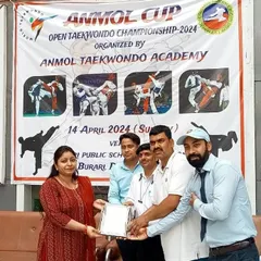 Presenting an award at the Anmol Cup. It's important to recognize the officials and supporters who help make our events possible.