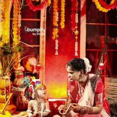 Maa ki godi mein chhota Gopal. This image of a mother as Yashoda gazing at her little Krishna is one of my favorites. It’s a timeless portrait of maternal love set against our detailed Vrindavan backdrop.
