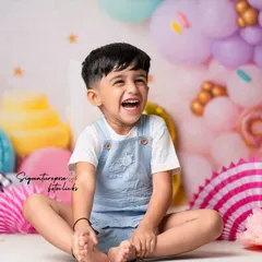 Pure, unfiltered joy! Milestone birthdays are a whirlwind of excitement, and we love capturing the vibrant energy of your child's celebration. This third birthday shoot was filled with laughter against a custom-designed candy-themed backdrop.