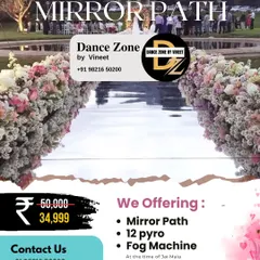 Our Mirror Path package is designed for maximum impact. It includes the reflective walkway, a dozen pyros for a sparkling effect, a fog machine for ambiance, and a rose petal pyro for a romantic floral shower during the Jaimala.