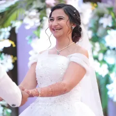 The pure happiness of a bride on her wedding day. For this Christian wedding, I created a soft, natural look with a simple updo to let her joyful smile be the focus. The makeup was designed to be light, fresh, and perfect for an outdoor ceremony.