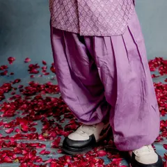 A detailed shot of the pleated Patiala pants in a beautiful lavender hue. We focus on every detail to ensure our outfits are as comfortable as they are stylish.