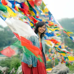 A happy moment in Mussoorie, with colorful Tibetan prayer flags fluttering in the wind. Being in the mountains, camera in hand, is my happy place.