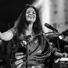Lost in the music at the Bengaluru Ganesh Utsava. This black and white photograph captures the pure joy and connection I feel when I perform, a moment where everything else fades away except the song.