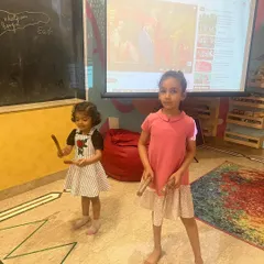 During our spring camp, we learned about different cultural dances. Here, the children are trying out some moves themselves.