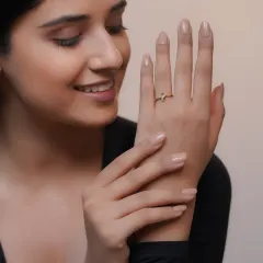 Another shot from the Calysta Diamonds campaign, showing the model admiring the ring to create an emotional connection with the product.