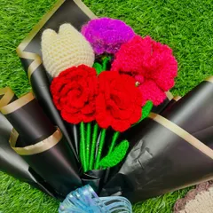 Another angle of a vibrant, mixed crochet flower bouquet. The combination of different textures and colors makes each arrangement a unique piece of art.