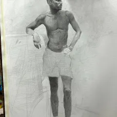 A closer view of the finished graphite life drawing. The focus here is on accurate proportions, shading, and capturing the structure of the human form.