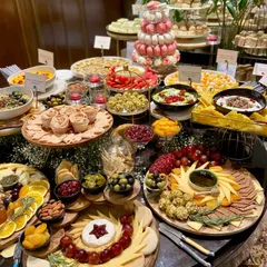A look at one of our spectacular grazing tables, crafted for a luxury brand event. We combine artisanal cheeses, fresh fruits, savory bites like spinach and feta tarts, and sweet treats like macaron towers to create a spread that is as beautiful as it is delicious.