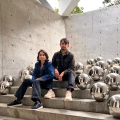 Our founders, Kanika and Gautam, surrounded by art and architecture. Their global education and work experience in Amsterdam, Rotterdam, and Milan inform our studio's unique design perspective.