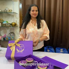 Posing proudly with the 75th birthday hamper we created! We love bringing your vision to life and creating gifts that celebrate life's biggest milestones.