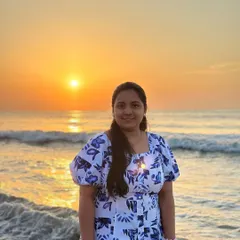 A beautiful portrait of a trekker enjoying the golden hour at a Pondicherry beach.