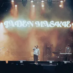 The stage lights, the smoke, and my name lighting up the backdrop. This shot from our Pune concert captures the complete atmosphere of a professional live music show with the full Maskie Band.