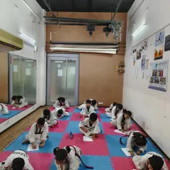 Taekwondo is a discipline of the mind as well as the body. Here, my students are taking the written test portion of their belt promotion exam, demonstrating their knowledge of theory and terminology.
