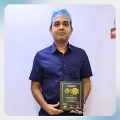 Our founder, Dr. Amit Agarkar, proudly holding the award for "Best Hair Restoration Clinic of the Year 2025." This recognition is a reflection of the trust thousands of clients place in us for their hair restoration journey.