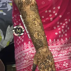 Another angle of a stunning bridal arm piece. Notice how the different elements like flowers, paisleys, and shading come together.