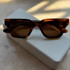 A close-up of these amazing sunglasses I picked up in New York. A great pair of sunnies is one of the easiest ways to elevate a look.