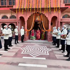 A grand welcome for the couple is where our hospitality begins. Our professional staff, in elegant uniforms, line the entrance of a beautiful palace venue, ready to serve and create a memorable start to the celebration.
