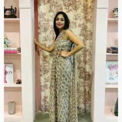 Our client Megha pictured in our signature draped saree dress in sequinned tulle, a pre-draped skirt with an attached pallu and a bandeau top.
