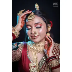 Another masterpiece by a Glamfort student. The eye makeup is the highlight here, with a stunning blend of colors and a sharp cut-crease. This is the level of perfection I teach.