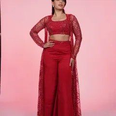 This red three-piece set with a sequined crop top, pants, and a sheer jacket is a total power move. It's bold, chic, and perfect for a cocktail party or reception.