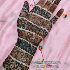 This unique design features horizontal bands of intricate patterns, a modern take on traditional Indian motifs. The use of negative space makes each band stand out.