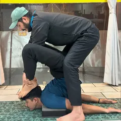 My Guru changed my life. This image shows an intense adjustment, a testament to his teaching style: "Wapas nahi aana hai!" (Don't come back!). He taught me discipline, surrender, and the true meaning of devotion.