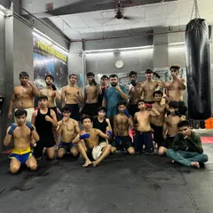 The results of hard work and dedication. Our team after an evening training session, showing the physique and confidence that comes from consistent effort.
