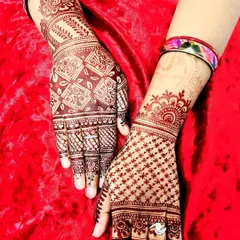 A beautiful design for the Teej festival. This features two different styles of jaal (net) patterns, one with stars and the other with leaves, for a unique and festive look.