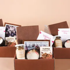 Inside the Wella hampers, we included a personalized photo frame, gourmet treats, and a scented candle. It's a thoughtful mix to show appreciation.